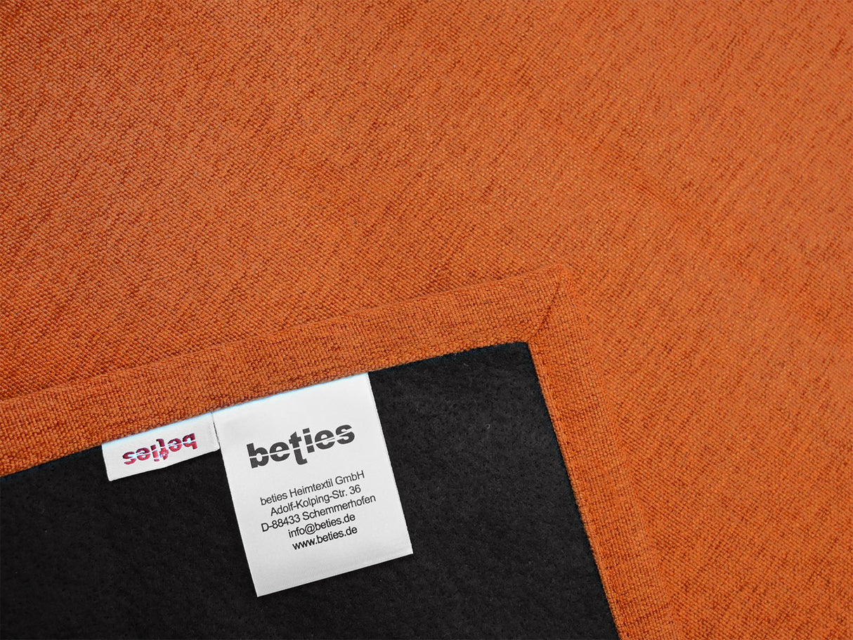 beties Wunschton Terracotta Orange – zweite Nahaufnahme melierter Möbelstoff, Gewebestruktur Detail mit briefeck