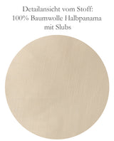 Vergroeserung der Stoffstruktur. Darauf sind die unregelmaessigen Verdickungen (Slups) des Fadens erkennbar.