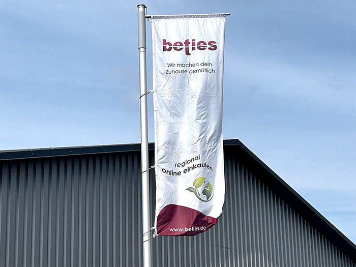 beties heimtextil flagge vor dem unternehmen